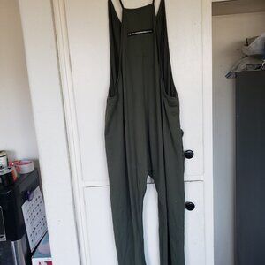 Green Overalls looks to be made from Cotton